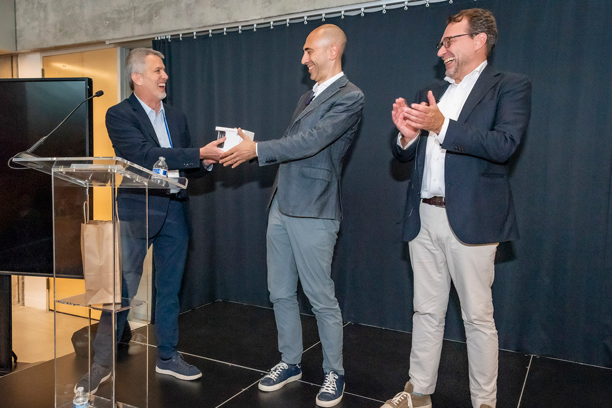 SIOE conference photo: Giorgio Zanarone celebrating 11 years as SIOE Secretary.